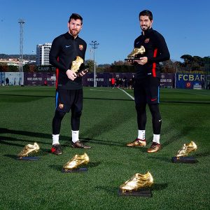 Messi e Suárez com suas Chuteiras de Ouro